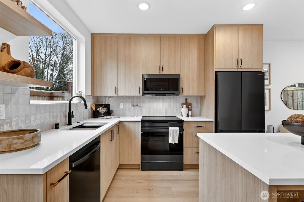 Photo of 11013 Goodwin Way NE, Seattle, WA 98125 (MLS # 2497959)