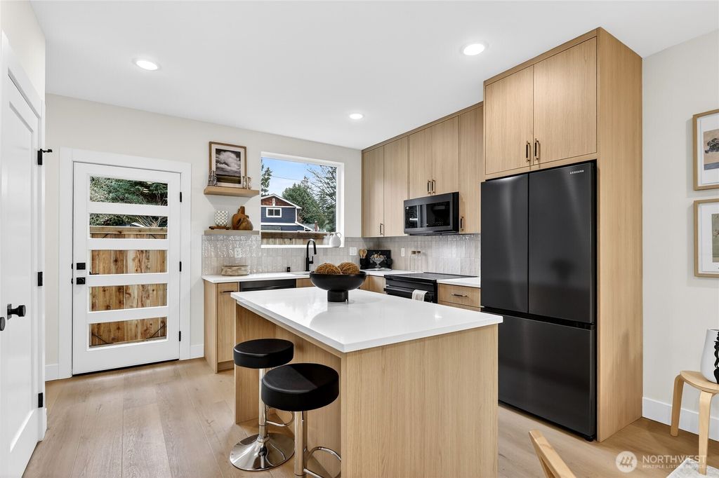 Photo of 11013 Goodwin Way NE, Seattle, WA 98125 (MLS # 2497959)