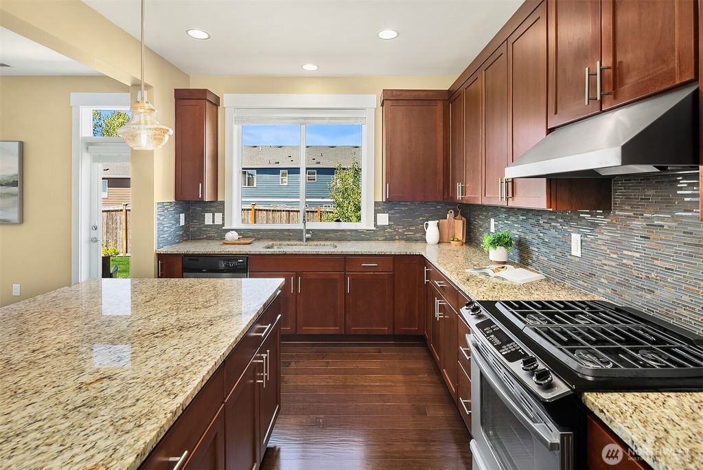 Photo of 5624 NE 8th Place, Renton, WA 98059 (MLS # 2408373)