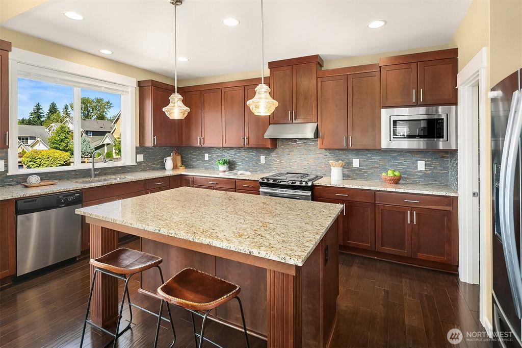 Photo of 5624 NE 8th Place, Renton, WA 98059 (MLS # 2408373)