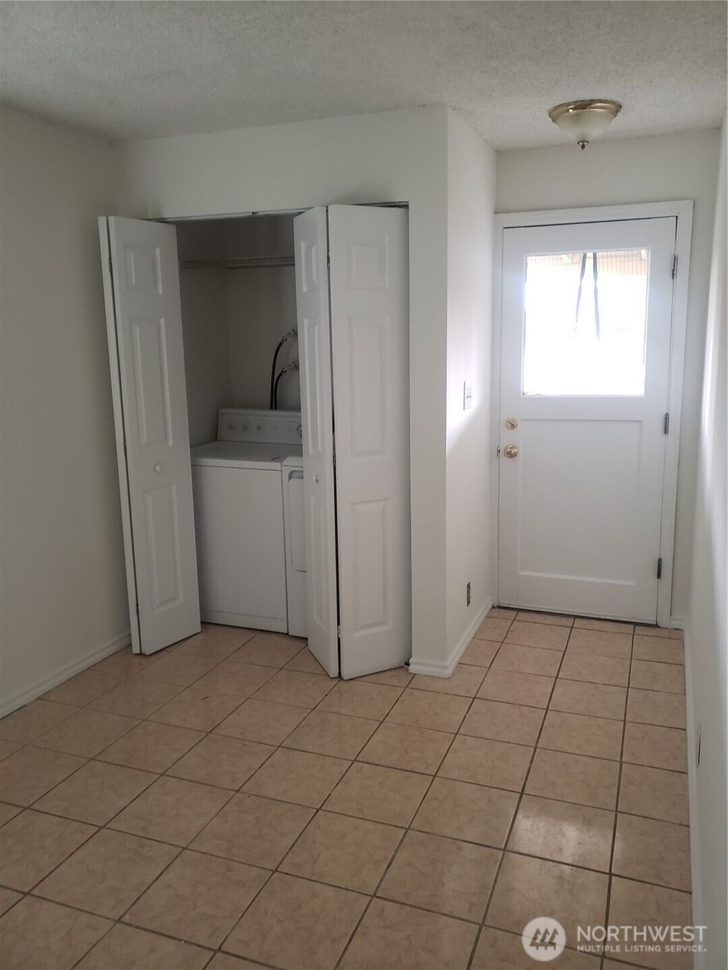 Photo of 3123 SW Barton Street, Seattle, WA 98126 (MLS # 2493301)