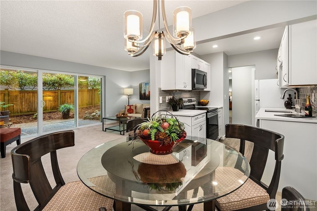 Photo of 5021 Ripley Lane N #8, Renton, WA 98056 (MLS # 2308283)