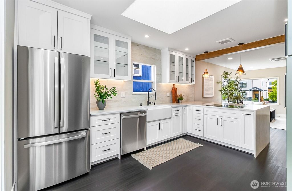 Photo of 4725 37th Avenue SW, Seattle, WA 98126 (MLS # 2405106)