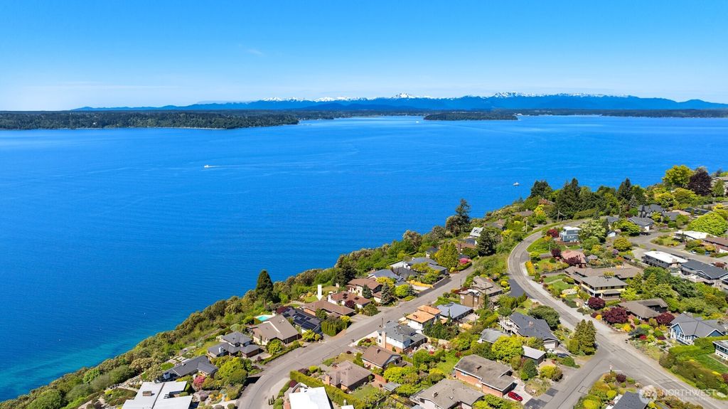Photo of 10825 44th Avenue SW, Seattle, WA 98146 (MLS # 2369201)