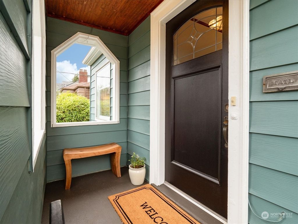 Photo of 7726 Mary Avenue NW, Seattle, WA 98117 (MLS # 2321167)