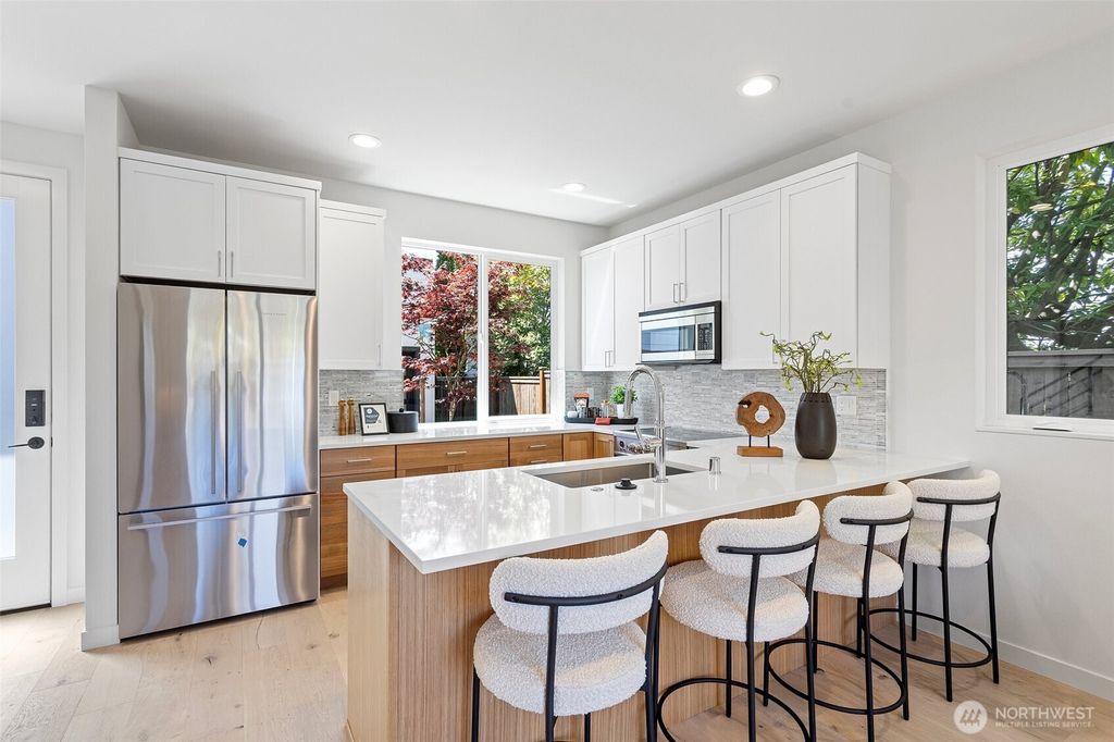 Photo of 3810 31st Avenue W, Seattle, WA 98199 (MLS # 2406649)