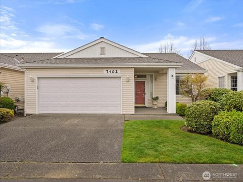 Photo of 7402 143rd Avenue Ct E, Sumner, WA 98390 (MLS # 2515143)