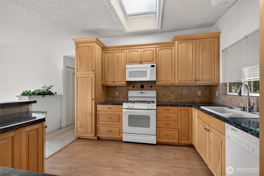 Photo of 609 168th Avenue NE, Bellevue, WA 98008 (MLS # 2573392)