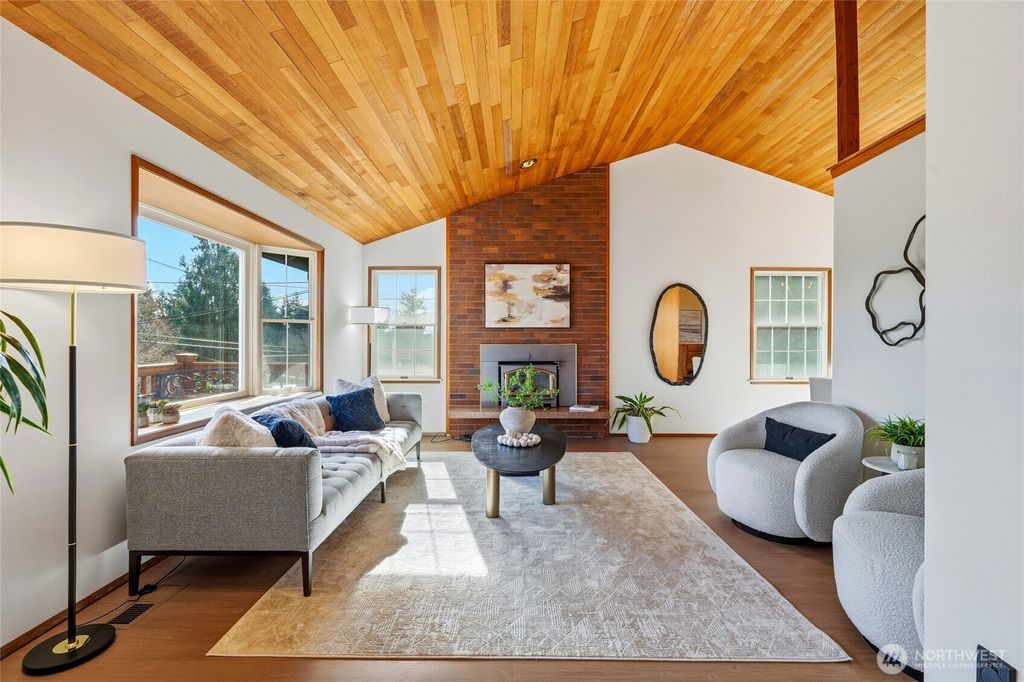 Photo of 10825 34th Avenue SW, Seattle, WA 98146 (MLS # 2485093)