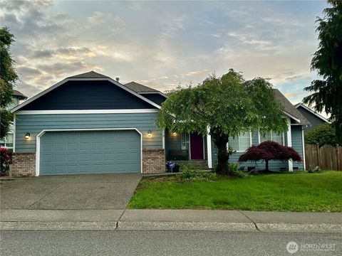 Photo of 12910 SE 217th Place, Kent, WA 98031 (MLS # 2529941)