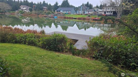 Photo of 107 Duck Lake Drive NE, Ocean Shores, WA 98569 (MLS # 2522320)