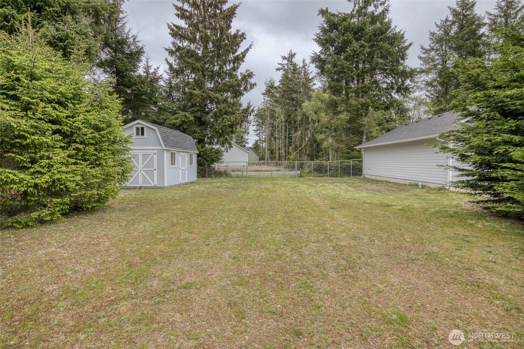 Photo of 107 Duck Lake Drive NE, Ocean Shores, WA 98569 (MLS # 2522320)