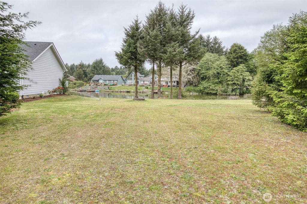 Photo of 107 Duck Lake Drive NE, Ocean Shores, WA 98569 (MLS # 2522320)