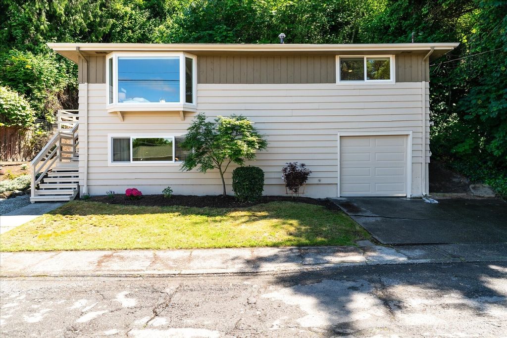 Photo of 5625 SW Teig Place, Seattle, WA 98116 (MLS # 2384943)