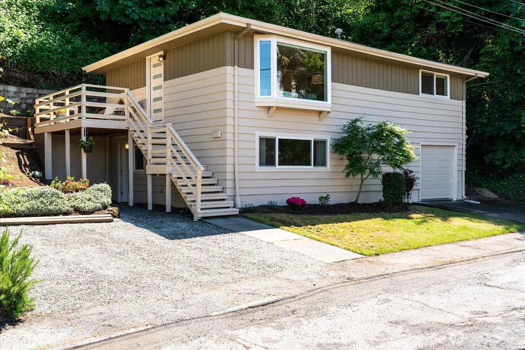 Photo of 5625 SW Teig Place, Seattle, WA 98116 (MLS # 2384943)