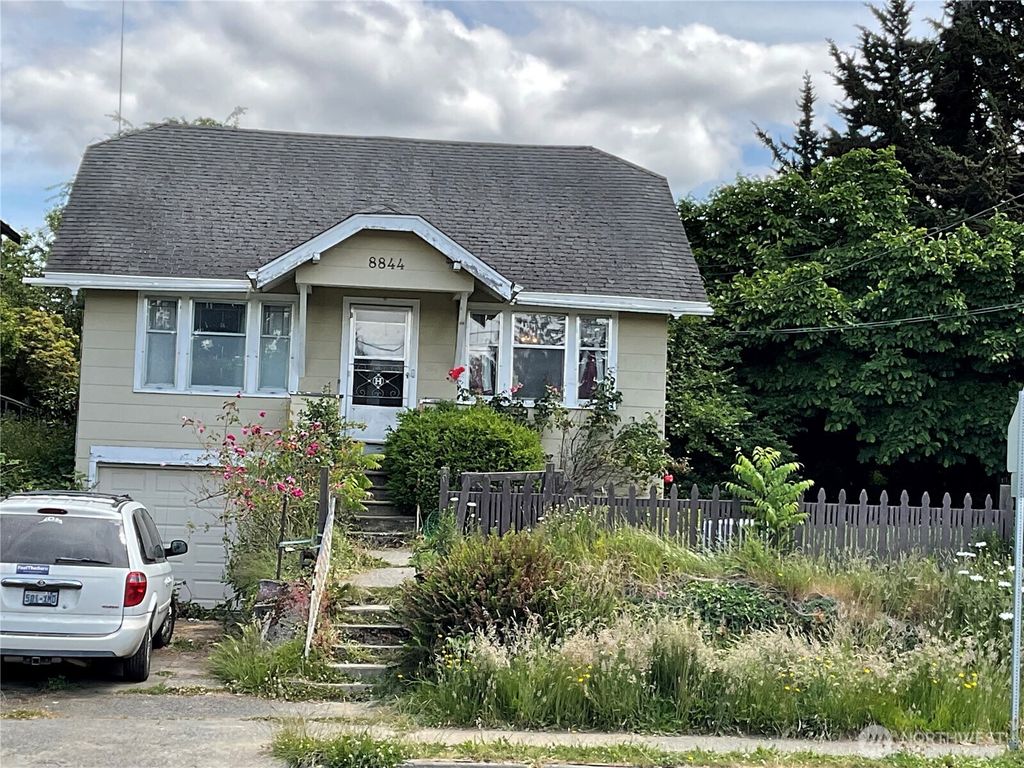 Photo of 8844 16th Avenue SW, Seattle, WA 98106 (MLS # 2409700)