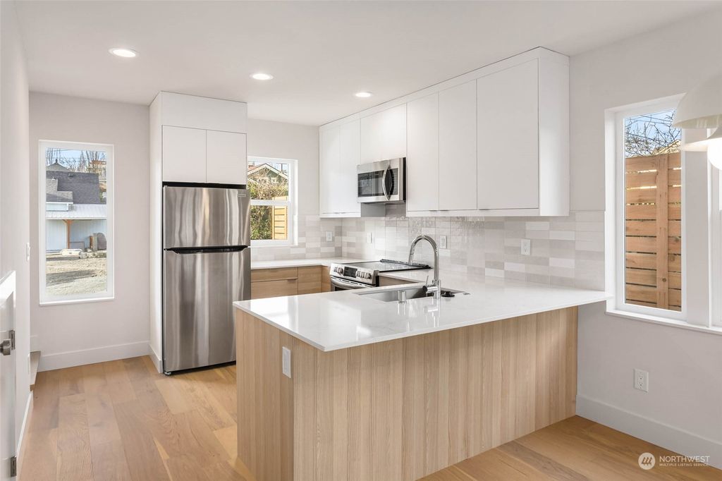 Photo of 2211 17th Avenue S, Seattle, WA 98144 (MLS # 2051093)