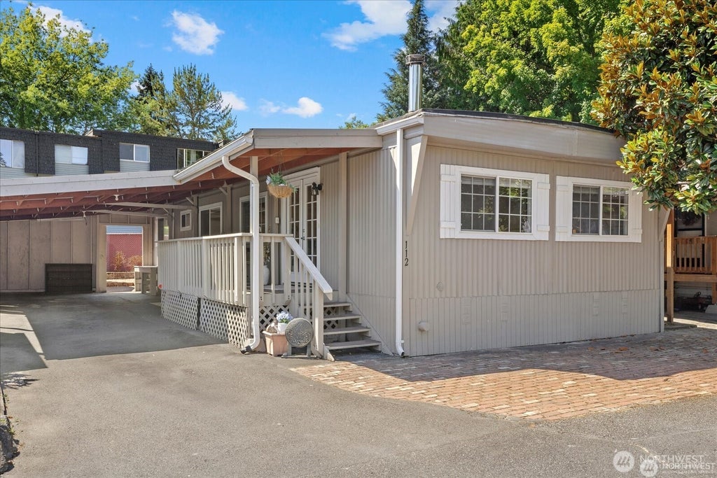 Photo of 7301 NE 175th Street #112, Kenmore, WA 98028 (MLS # 2552013)