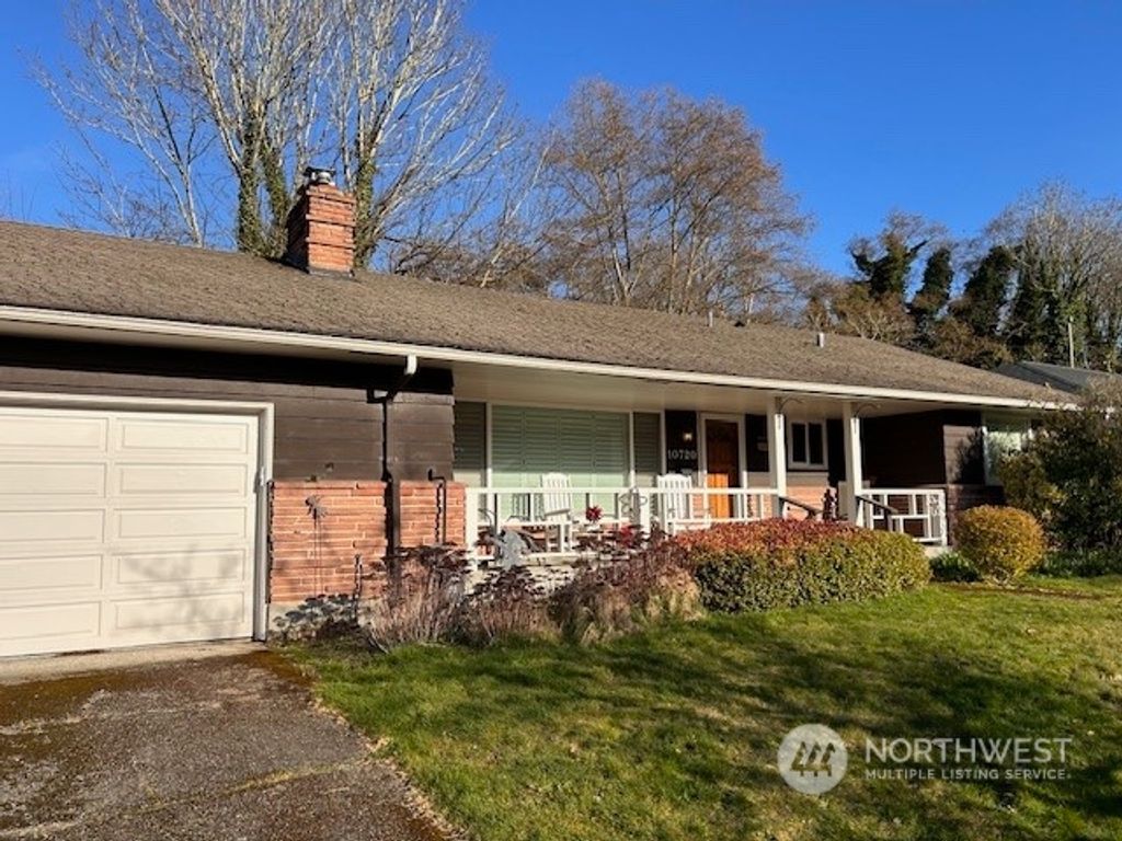 Photo of 10720 9th Avenue NW, Seattle, WA 98177 (MLS # 2241236)