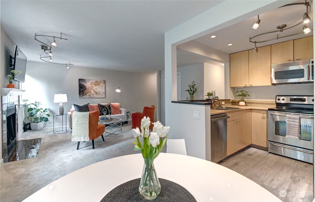 Photo of 8240 126th Avenue NE #A-103, Kirkland, WA 98033 (MLS # 2073356)