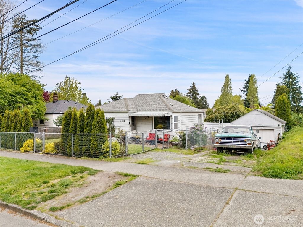 Photo of 1616 SW Thistle Street, Seattle, WA 98106 (MLS # 2514183)