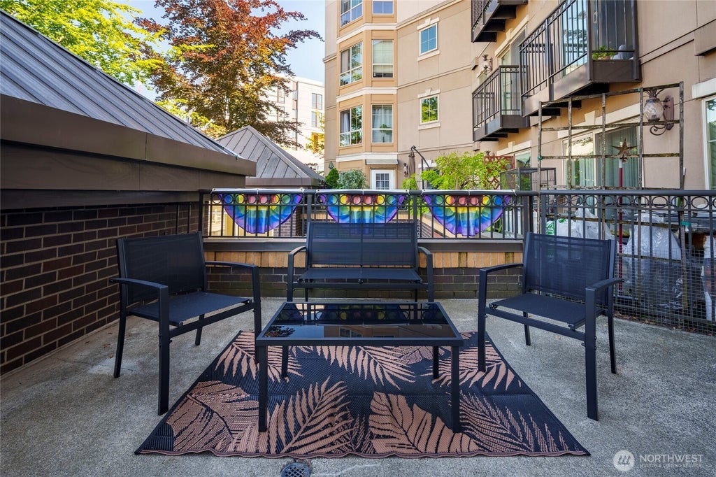 Photo of 1125 E Olive Street #202, Seattle, WA 98122 (MLS # 2535612)