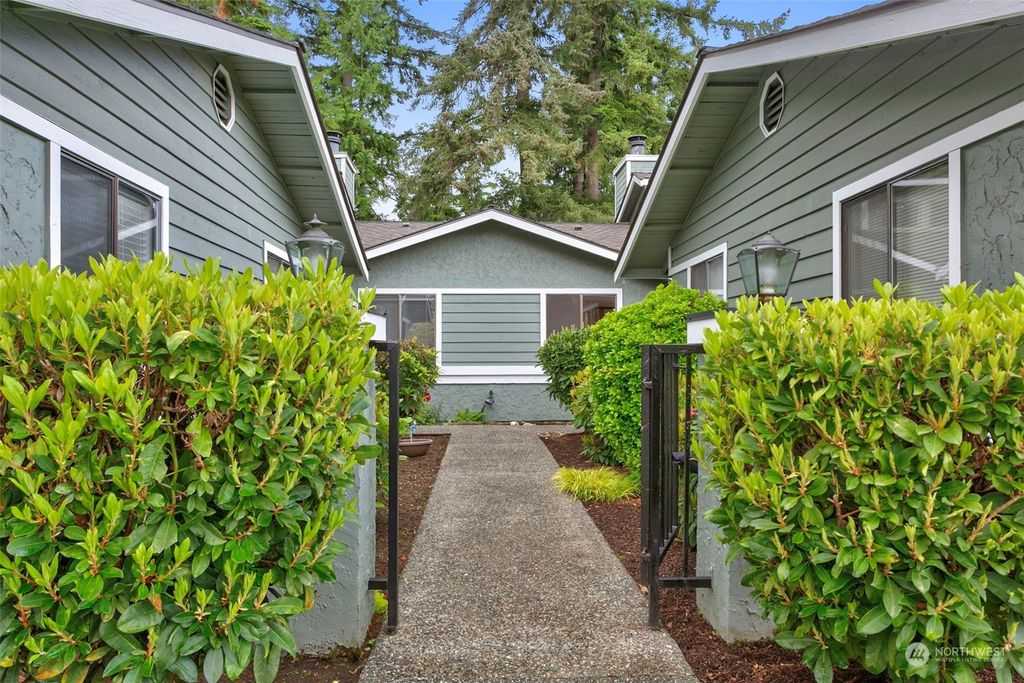 Photo of 15928 Village Green Drive #C, Mill Creek, WA 98012 (MLS # 2239011)