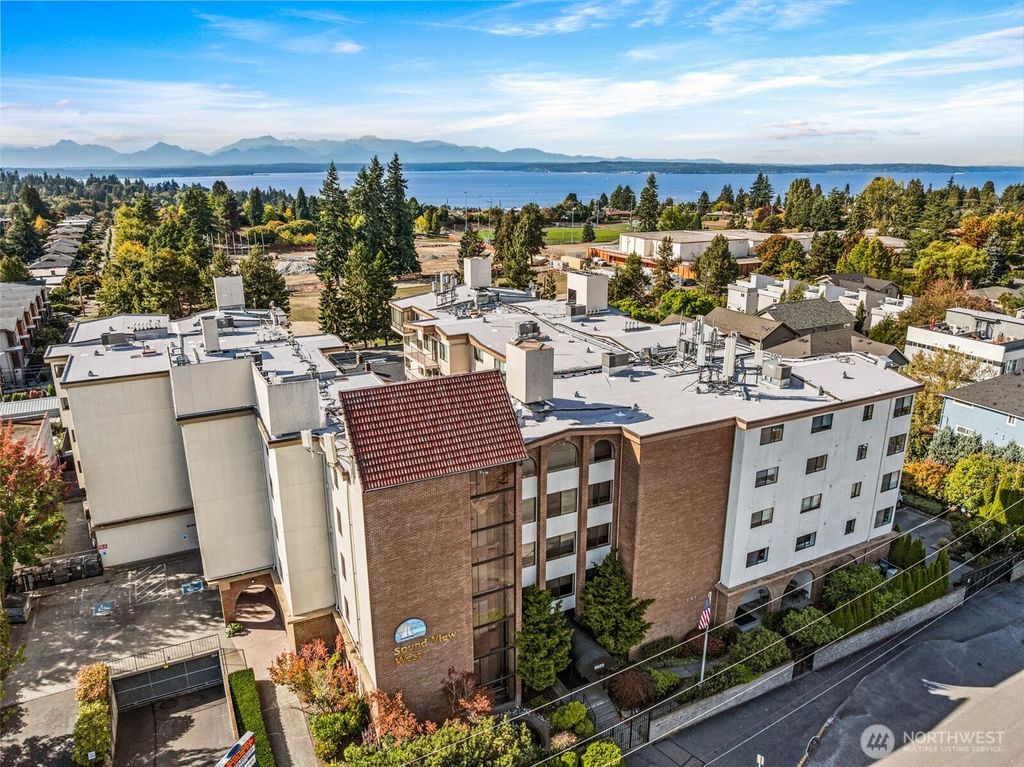 Photo of 9023 Mary Avenue NW #401, Seattle, WA 98117 (MLS # 2438841)