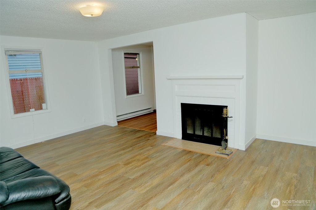 Photo of 12037 71st Avenue S, Seattle, WA 98178 (MLS # 2433539)