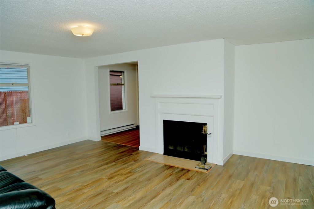 Photo of 12037 71st Avenue S, Seattle, WA 98178 (MLS # 2433539)