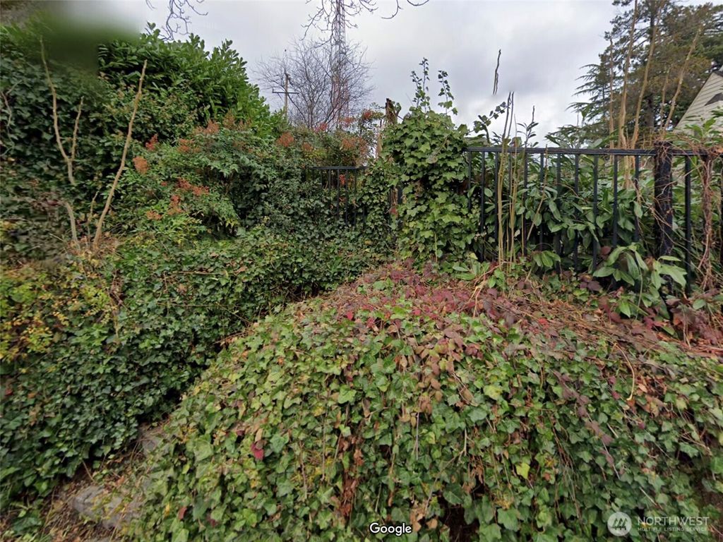 Photo of 1223 Warren Place N, Seattle, WA 98119 (MLS # 2421826)