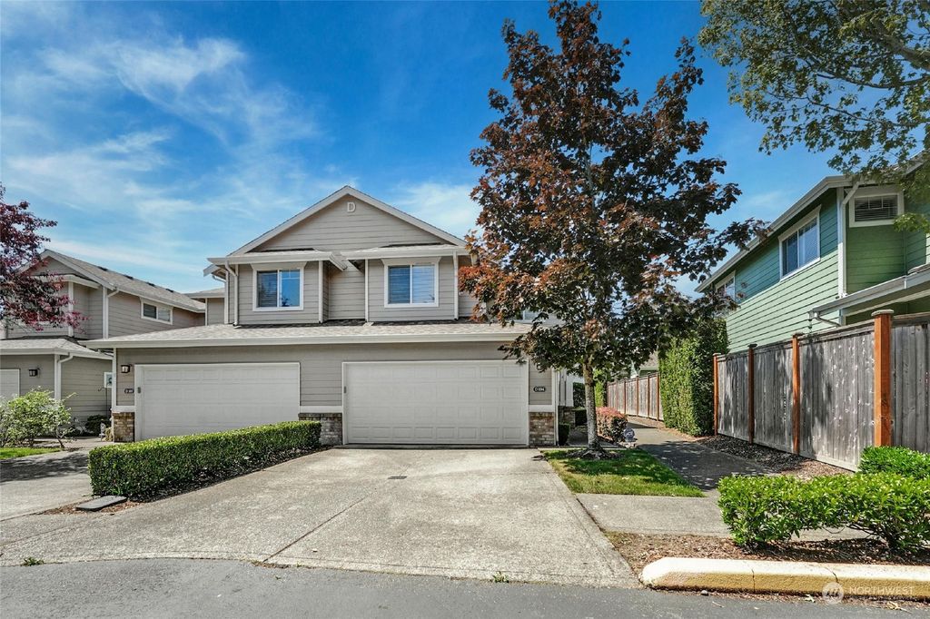Photo of 10700 SE 260th Street #D104, Kent, WA 98030 (MLS # 2255334)