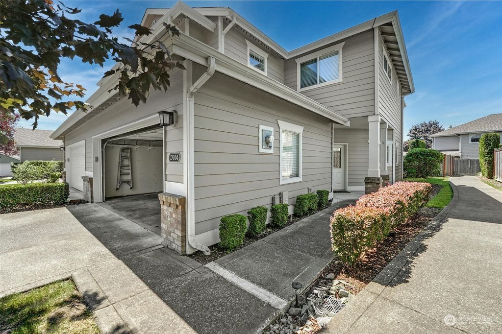 Photo of 10700 SE 260th Street #D104, Kent, WA 98030 (MLS # 2255334)
