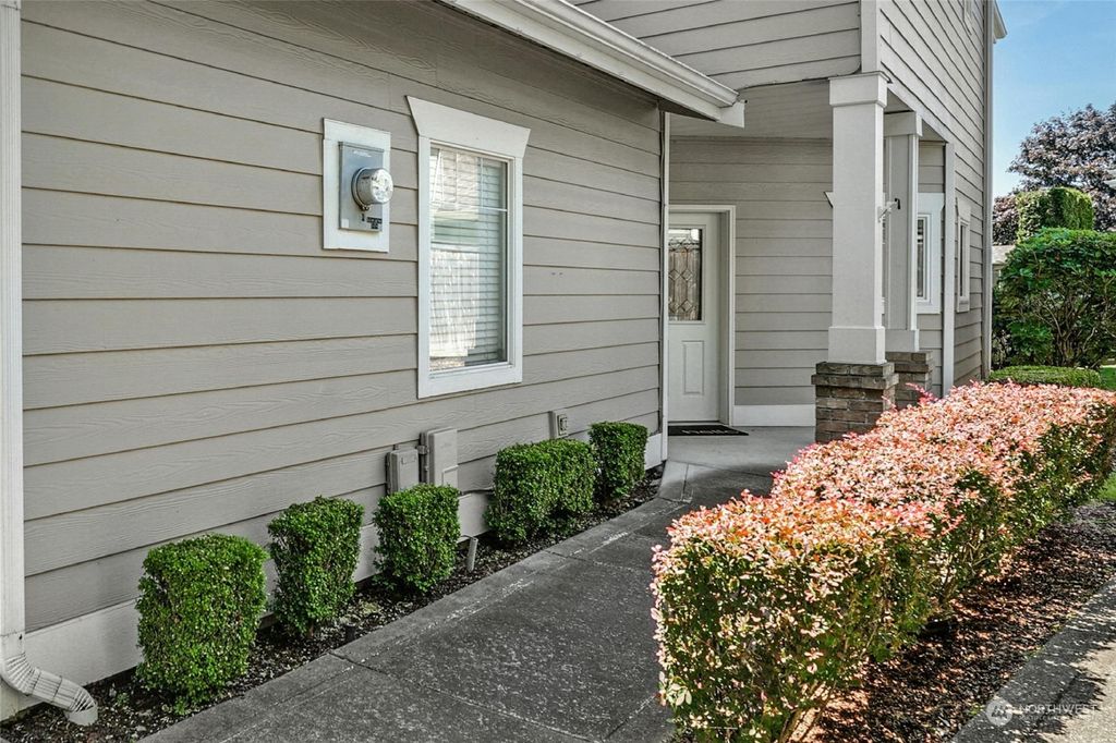 Photo of 10700 SE 260th Street #D104, Kent, WA 98030 (MLS # 2255334)