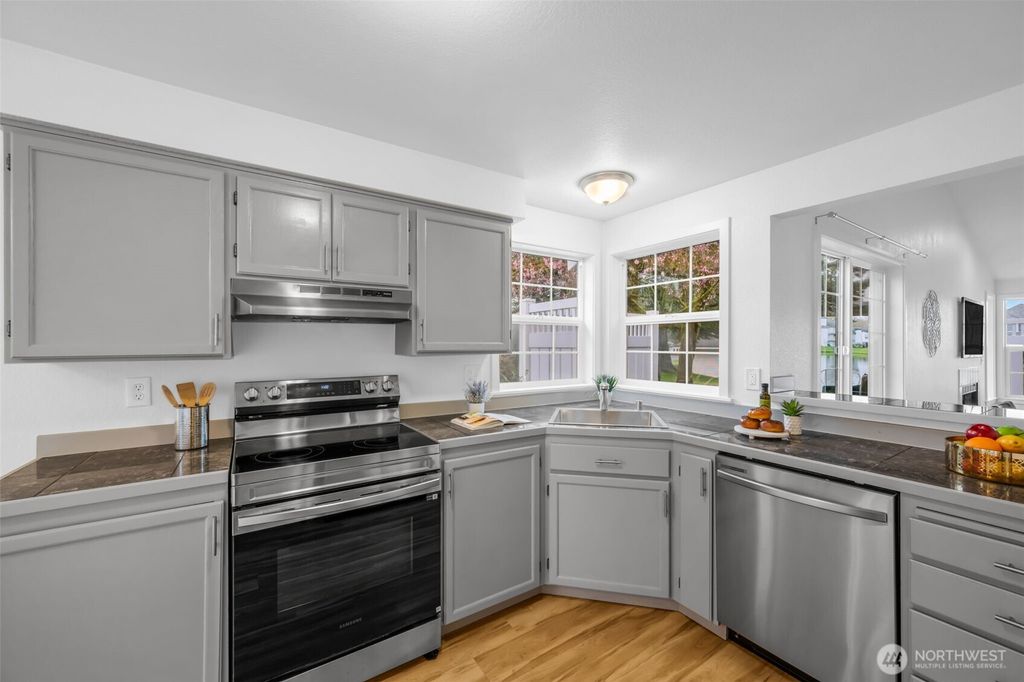 Photo of 5736 S 238 Court #E1, Kent, WA 98032 (MLS # 2495080)