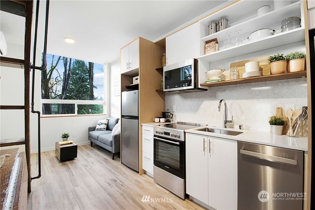 Photo of 3861 21st Ave SW Ave, Seattle, WA 98106 (MLS # 2267418)