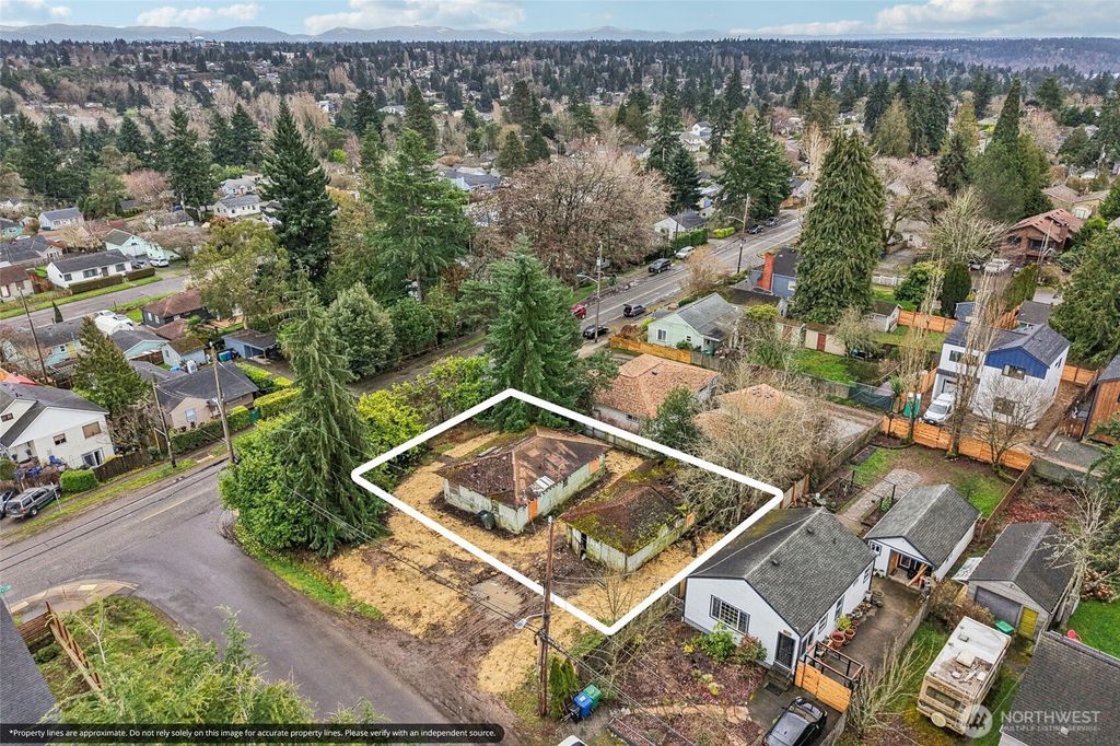 Photo of 9805 35th Avenue SW, Seattle, WA 98126 (MLS # 2483036)