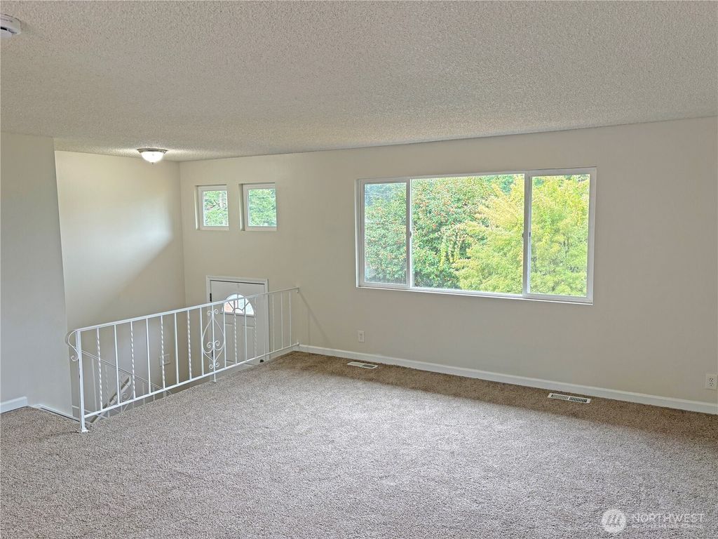 Photo of 16312 127th Place SE, Renton, WA 98058 (MLS # 2425025)