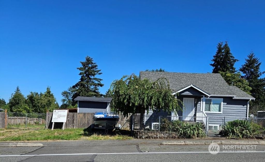 Photo of 10616 12th Avenue SW, Seattle, WA 98146 (MLS # 2285257)