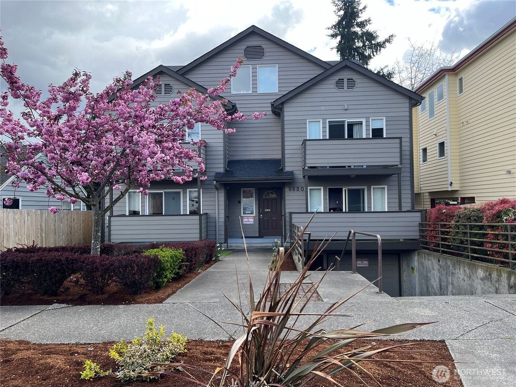 Photo of 8830 Nesbit Avenue N, Seattle, WA 98103 (MLS # 2499829)