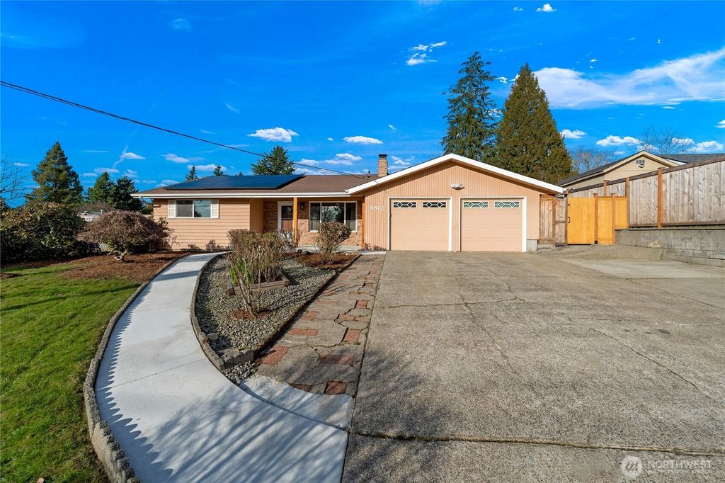 Photo of 9812 S 212th St St, Kent, WA 98031 (MLS # 2486135)