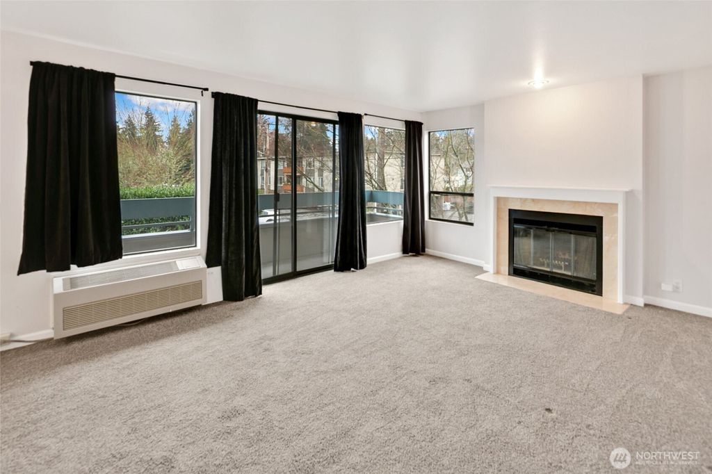 Photo of 12300 33rd Avenue NE #202, Seattle, WA 98125 (MLS # 2491448)