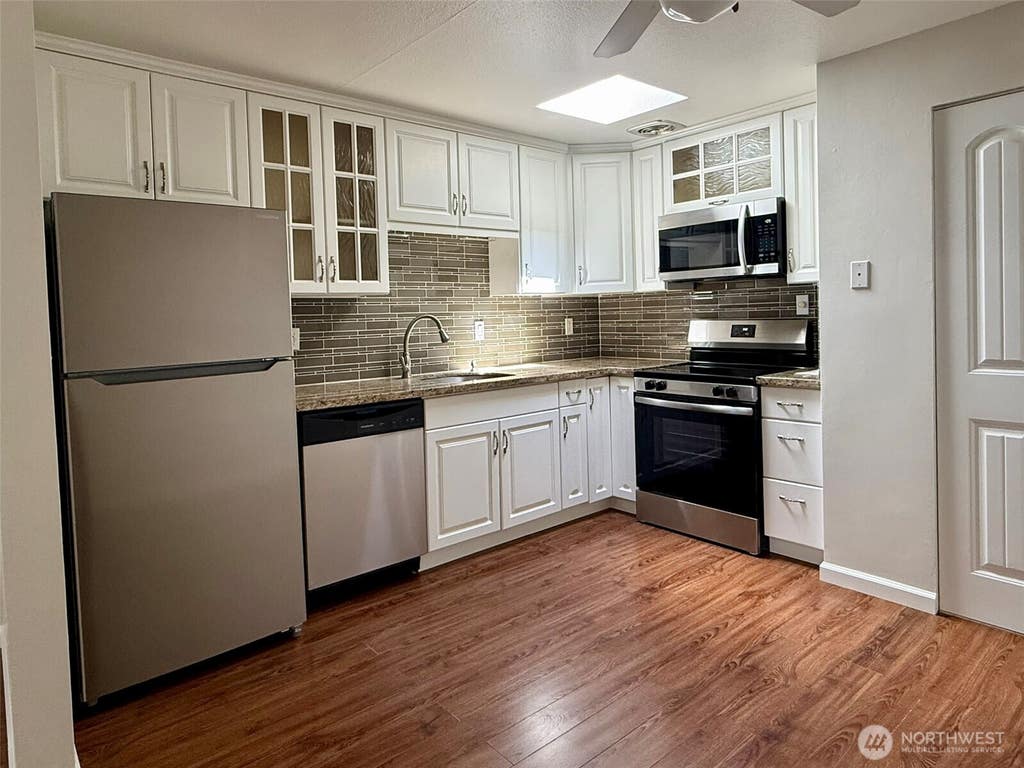 Photo of 4308 NE Sunset Boulevard #Y2, Renton, WA 98059 (MLS # 2562763)