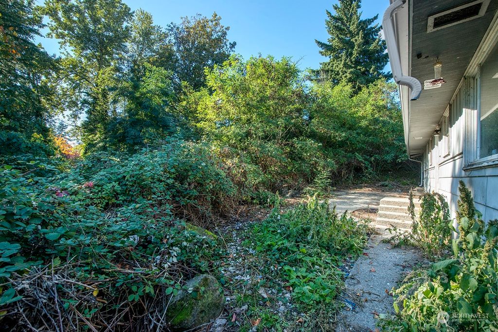 Photo of 12045 70th Place S, Seattle, WA 98178 (MLS # 2168081)