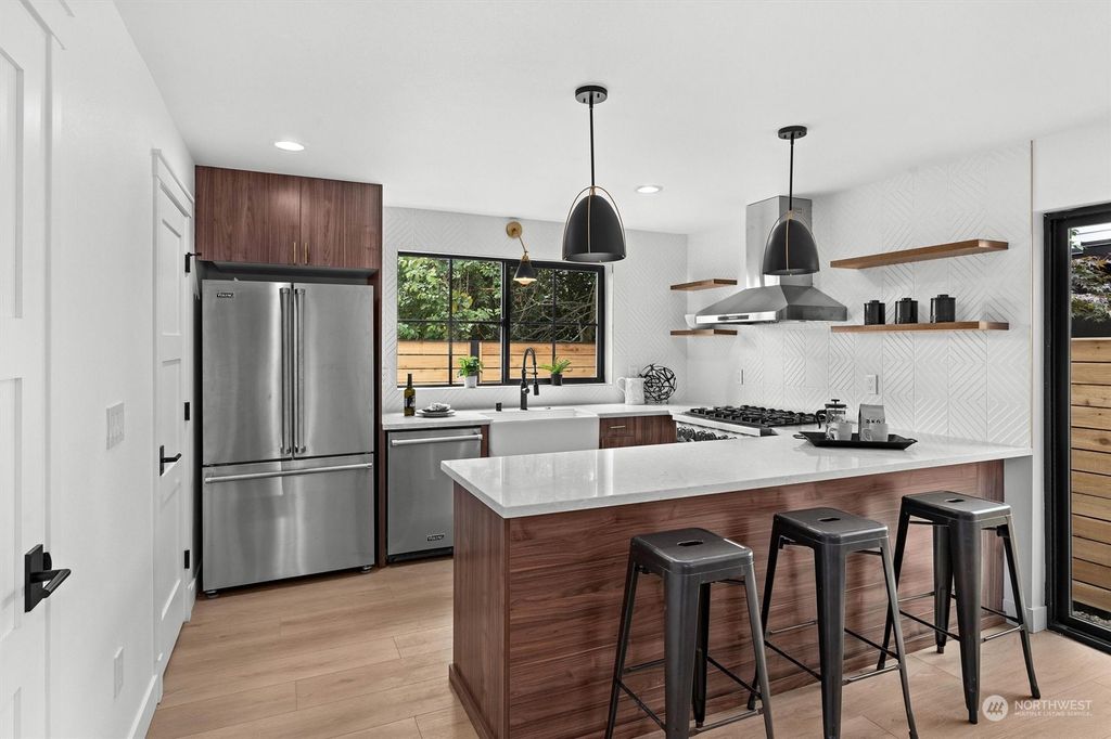 Photo of 8717 13th Avenue NW #B, Seattle, WA 98117 (MLS # 2157876)