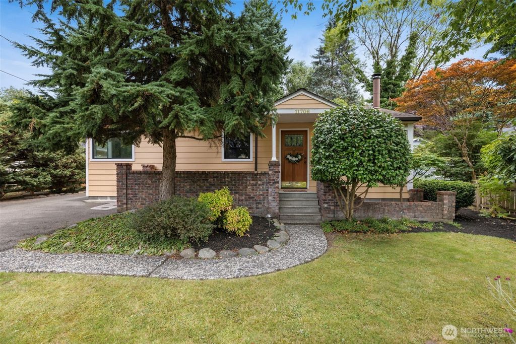 Photo of 11706 40th Ave NE Ave, Seattle, WA 98125 (MLS # 2407034)