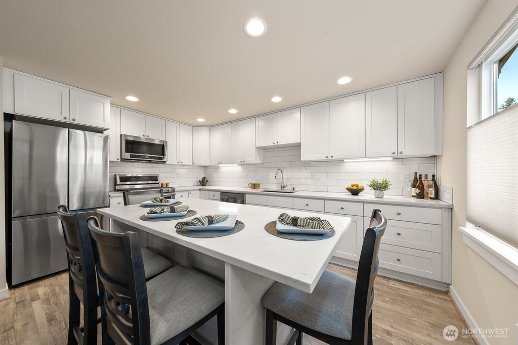 Photo of 12011 9th Avenue NW #2, Seattle, WA 98177 (MLS # 2513116)