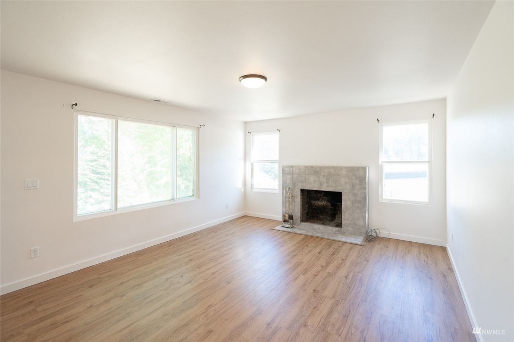 Photo of 11005 26th Avenue S, Seattle, WA 98168 (MLS # 1984620)