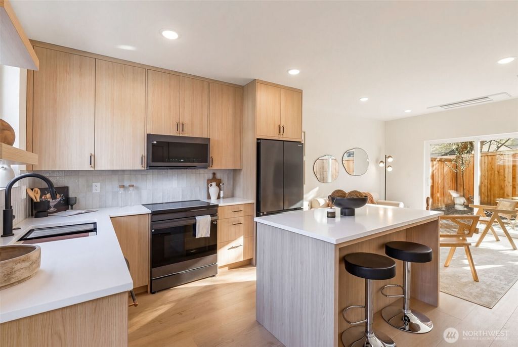 Photo of 11013 Goodwin Way NE, Seattle, WA 98125 (MLS # 2520040)