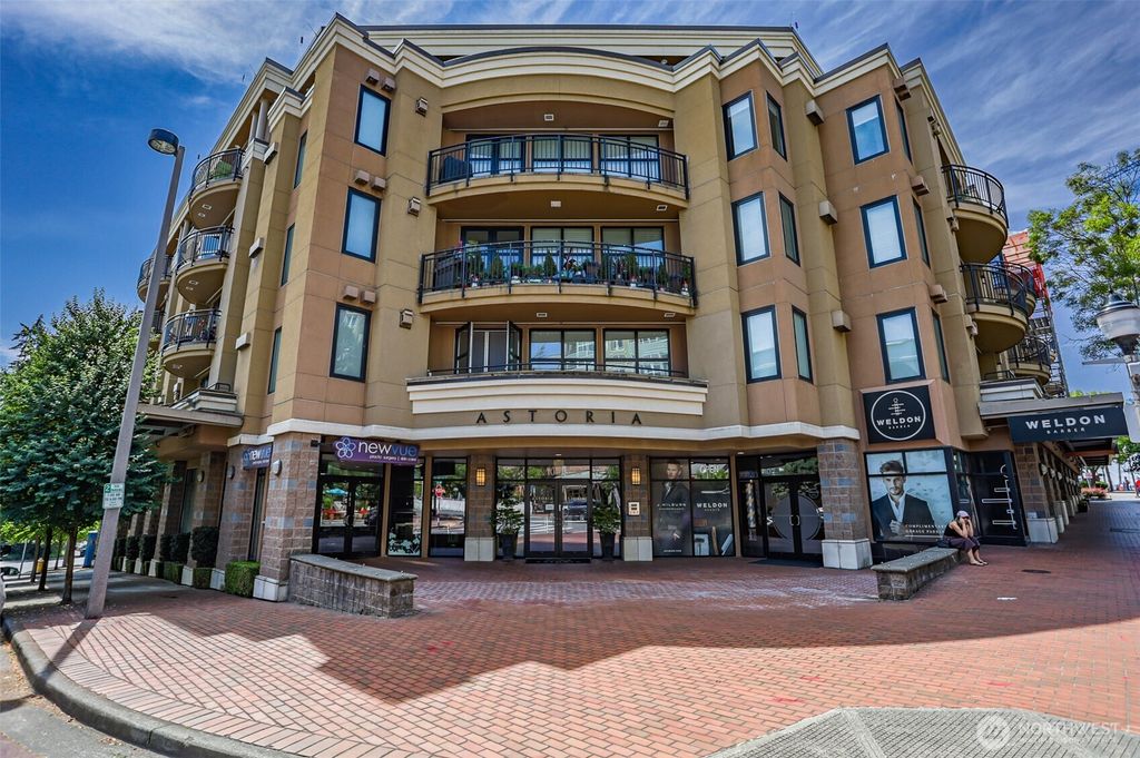 Photo of 10047 Main Street #206, Bellevue, WA 98004 (MLS # 2442019)